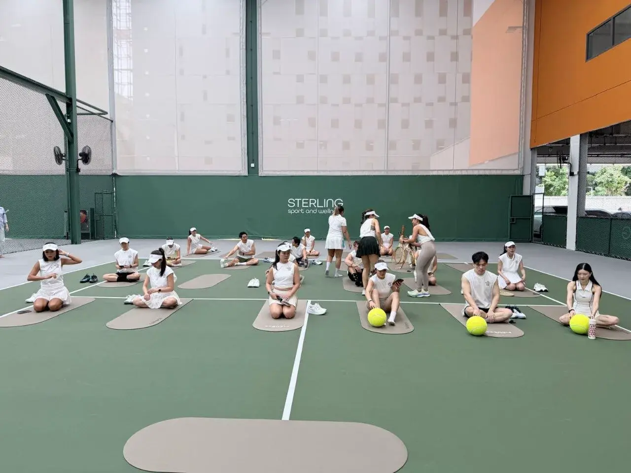 Yoga cool-down on the tennis court
